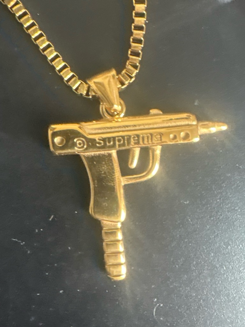 Supreme Gold-tone Uzi Pendant Necklace